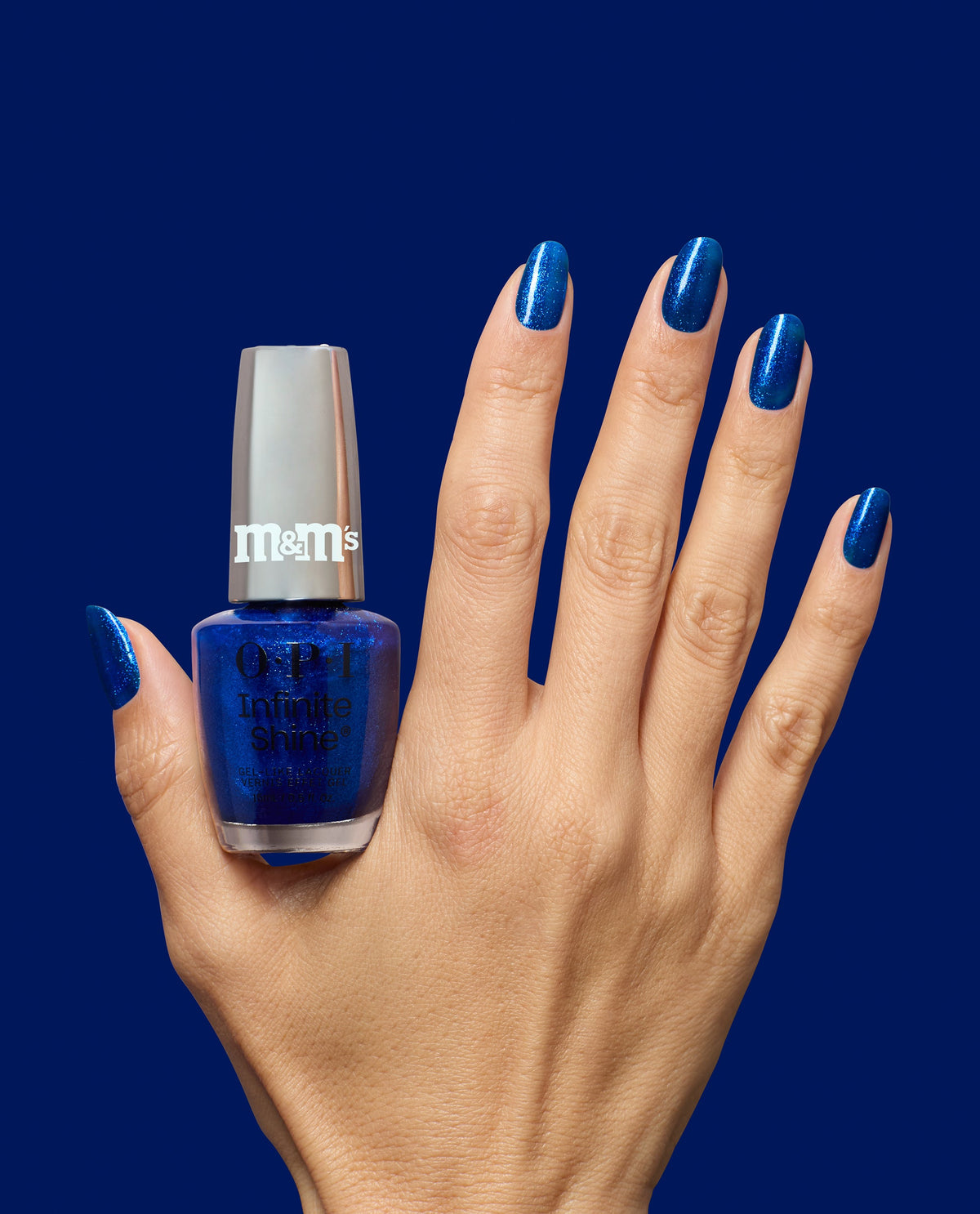 OPI x M&M'S Infinite Shine - Fa La La La Yum (HRT17)