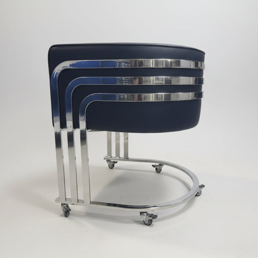 Stack of black and chrome bar stools in a store setting