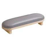 a arm rest for nail technicians with a wooden base and grey pu leather cushion