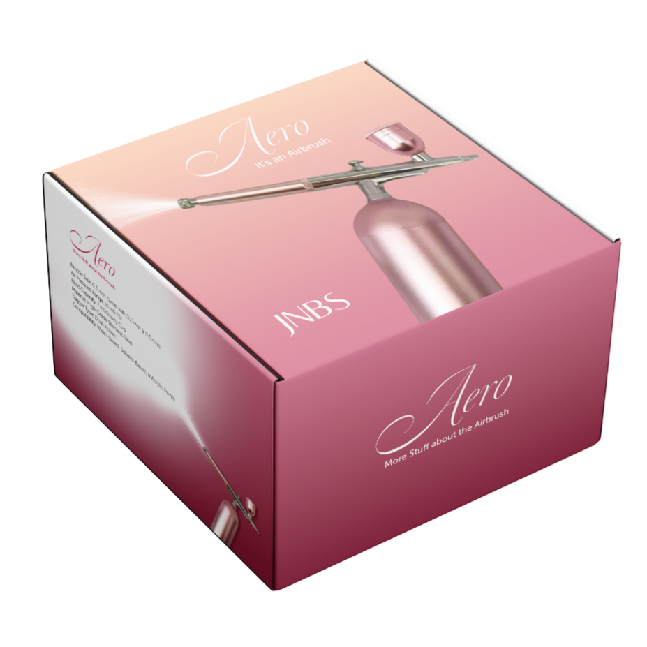 pink nail air brush machine in a pink box